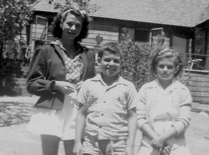 1944. Mom's in the hospital. I'm in summer camp at Lake Arrowhead, being visited by neighbors, Judy & Sue Stefan. 
